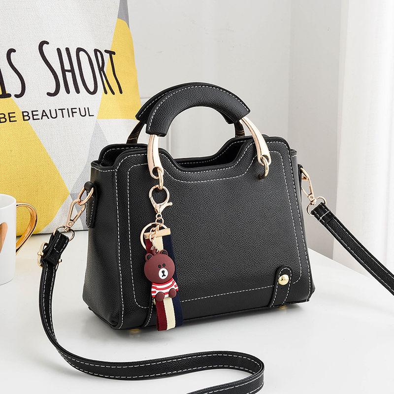 Genuine leather women handbag Top-handle bag Small crossbody Shoulder Bags With Little bear pendant