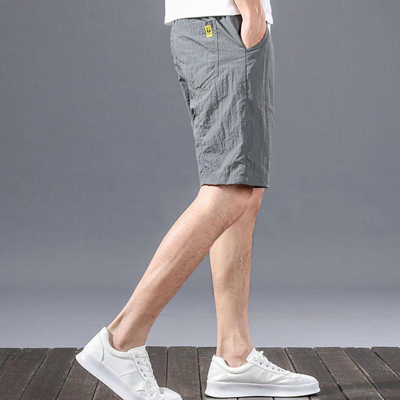 Men's Large Size Spring and Summer Breathable Ice Silk Casual Shorts Straight Tube All-match Cool Five-point Pants Sports Loose Beach Pants