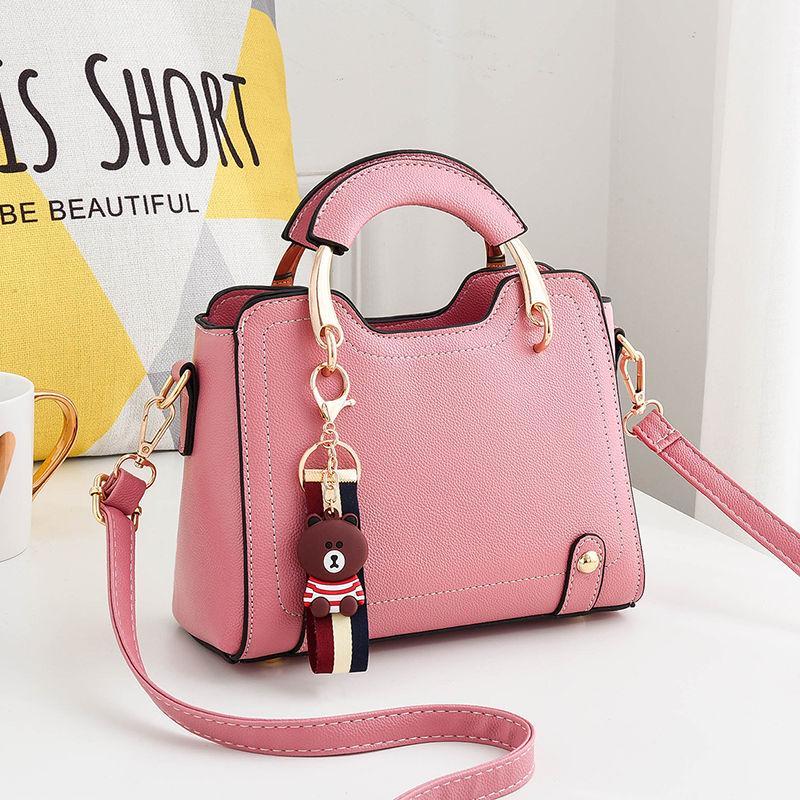 Genuine leather women handbag Top-handle bag Small crossbody Shoulder Bags With Little bear pendant