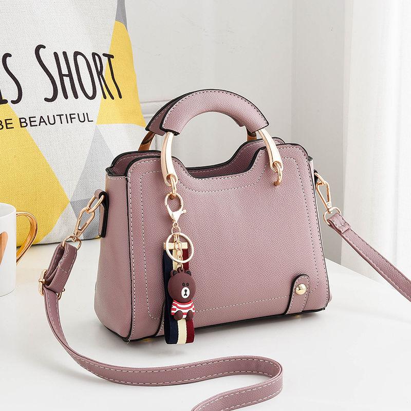 Genuine leather women handbag Top-handle bag Small crossbody Shoulder Bags With Little bear pendant