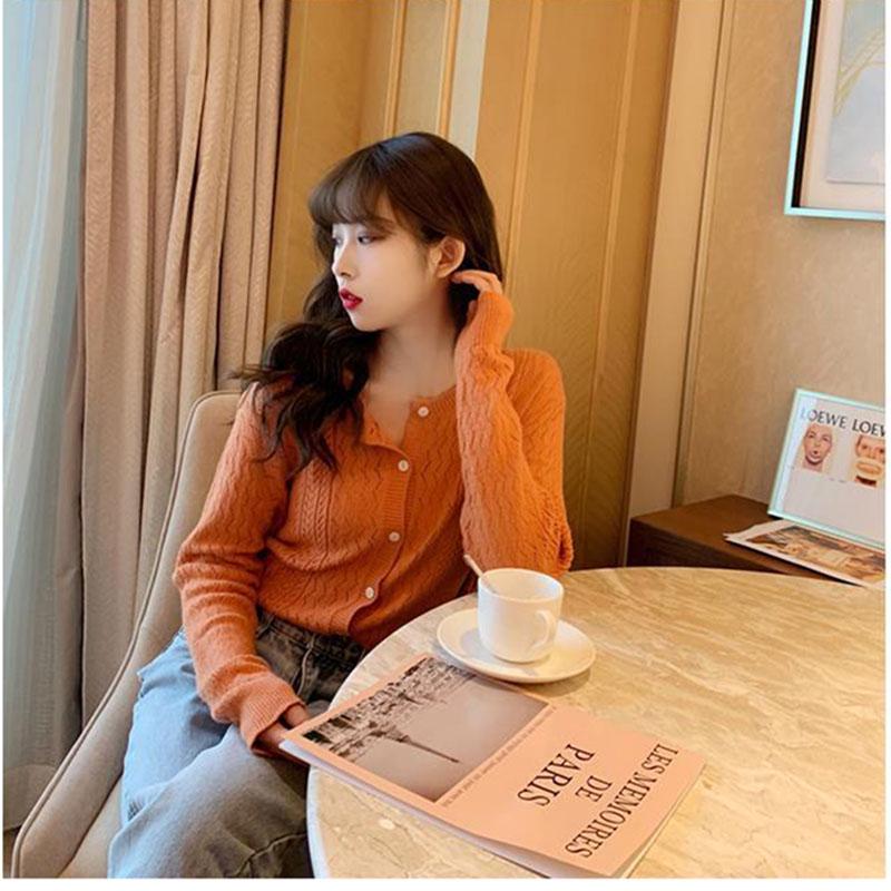 Spring and Autumn Solid Color Button Sweater Loose Fashion Cardigan Jacket Hollow Knitted Women's Top