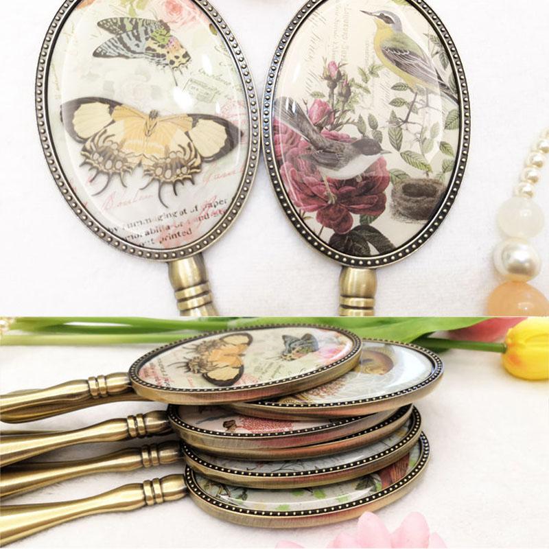 European Style Women Exquisite Oval Mirror Retro Bronze Makeup Mirror with Metal Handle Portable Hand-held Small Mirror