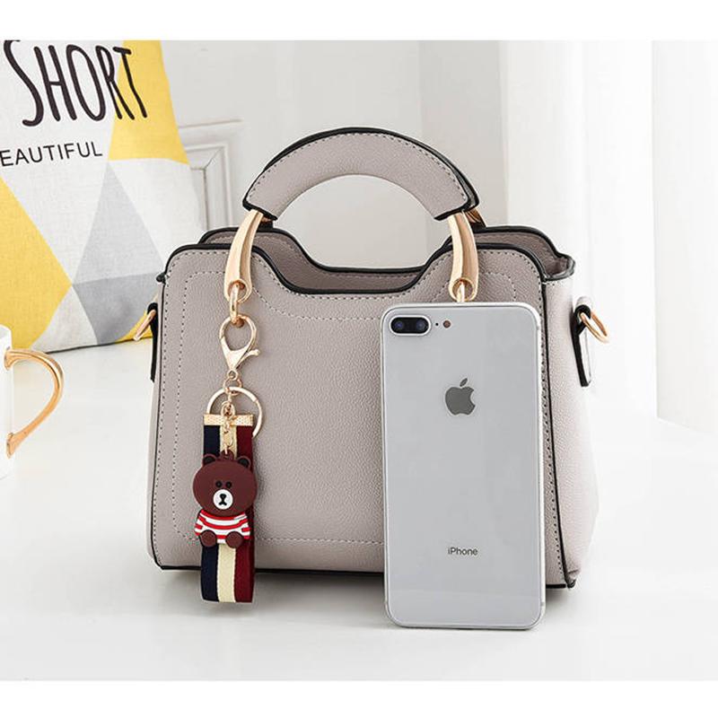 Genuine leather women handbag Top-handle bag Small crossbody Shoulder Bags With Little bear pendant