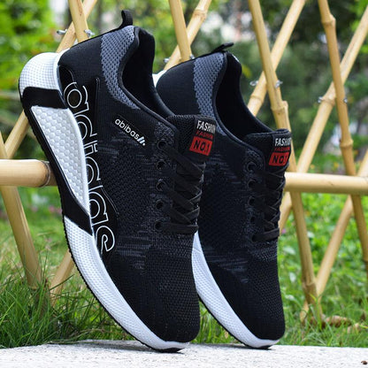 Net shoes men Korean version wild running leisure sports summer breathable flying woven mesh shoes