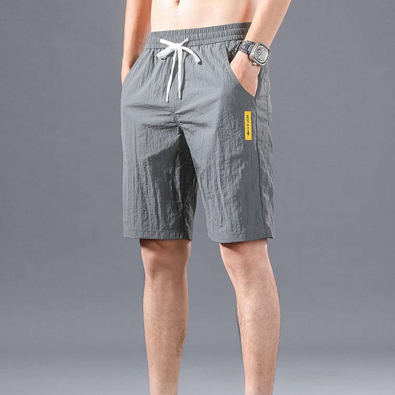 Men's Large Size Spring and Summer Breathable Ice Silk Casual Shorts Straight Tube All-match Cool Five-point Pants Sports Loose Beach Pants