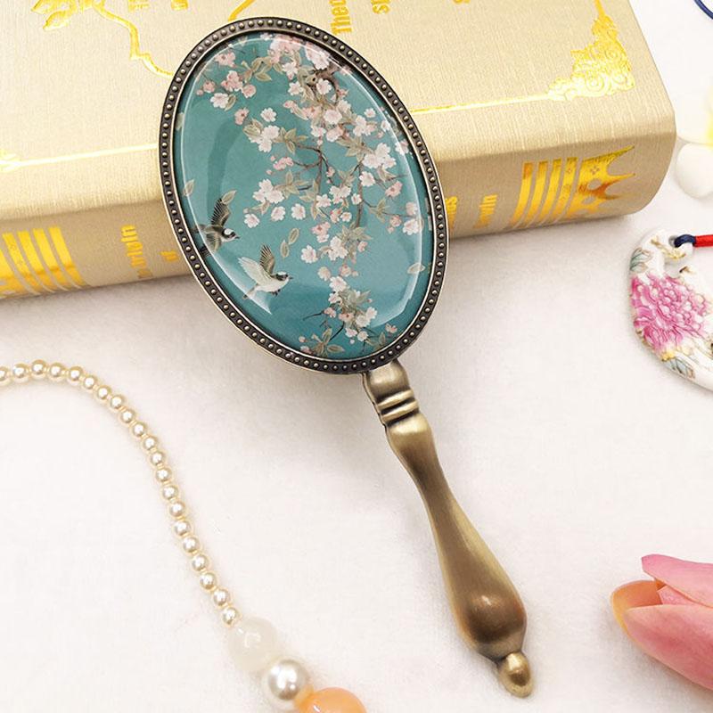 European Style Women Exquisite Oval Mirror Retro Bronze Makeup Mirror with Metal Handle Portable Hand-held Small Mirror