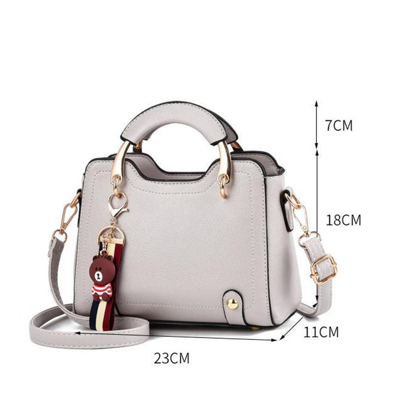 Genuine leather women handbag Top-handle bag Small crossbody Shoulder Bags With Little bear pendant