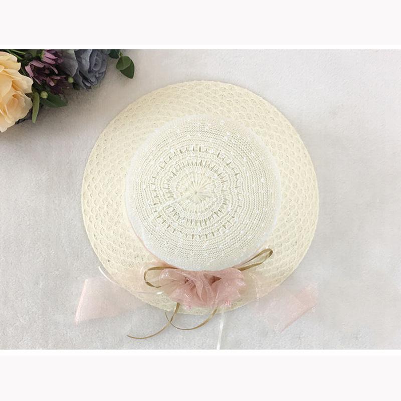 Women's Sun Cap Summer Flower Ribbon Bow Straw Hat Sunscreen Hollow Out Beach Holiday Vacation Anti-UV Hat All-match Sun Hat