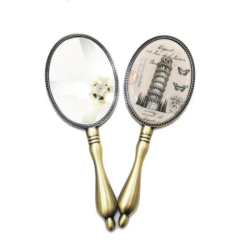 European Style Retro Bronze Makeup Mirror with Metal Handle Portable Hand-held Small Mirror Women Exquisite Oval Mirror