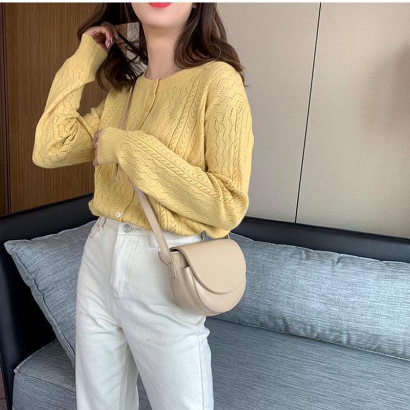 Spring and Autumn Solid Color Button Sweater Loose Fashion Cardigan Jacket Hollow Knitted Women's Top